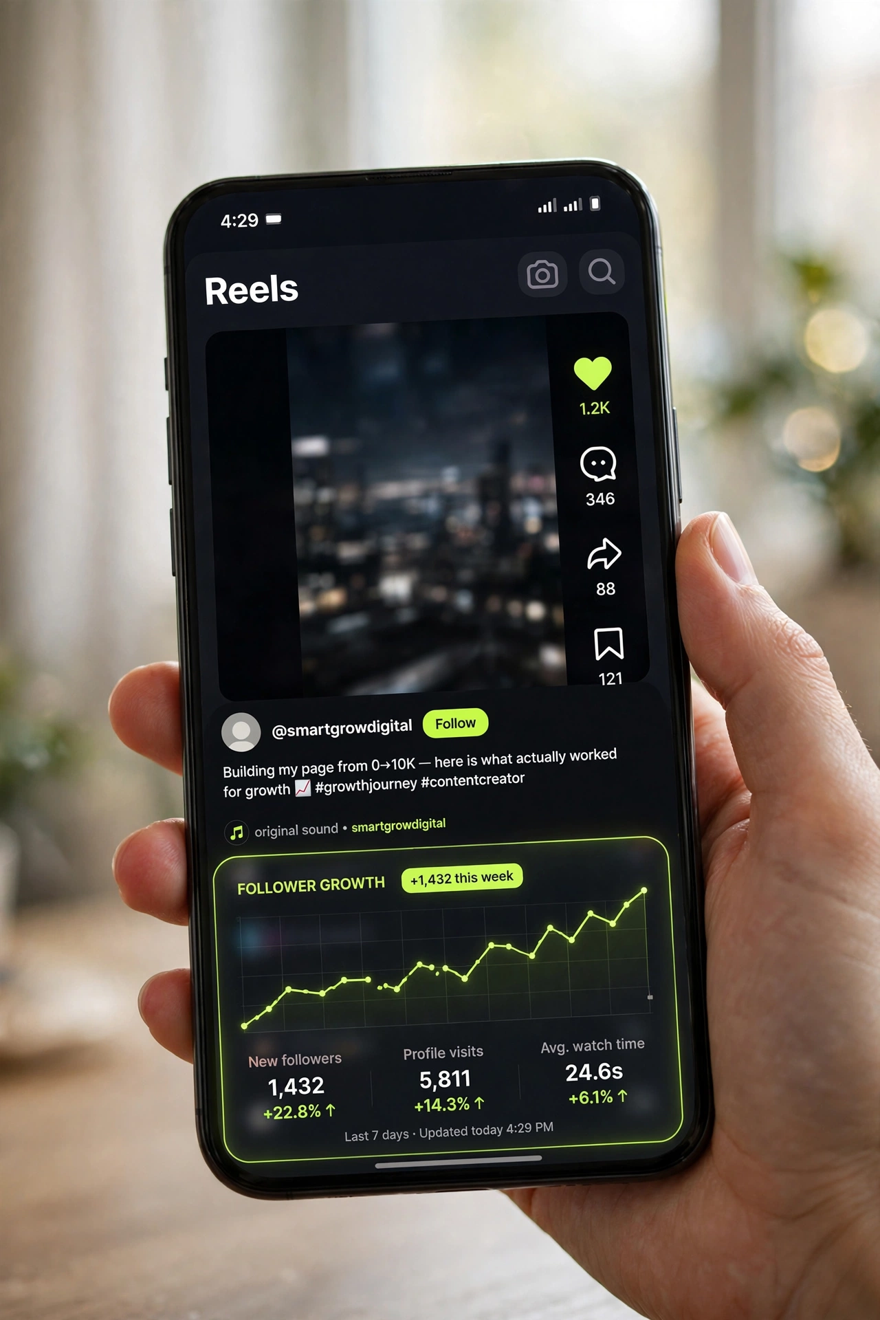 Phone showing social media growth results